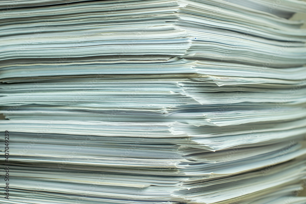 bundles bales of paper documents. stacks packs pile on the desk in the office bundles bales of paper documents. stacks packs pile on the desk in the office