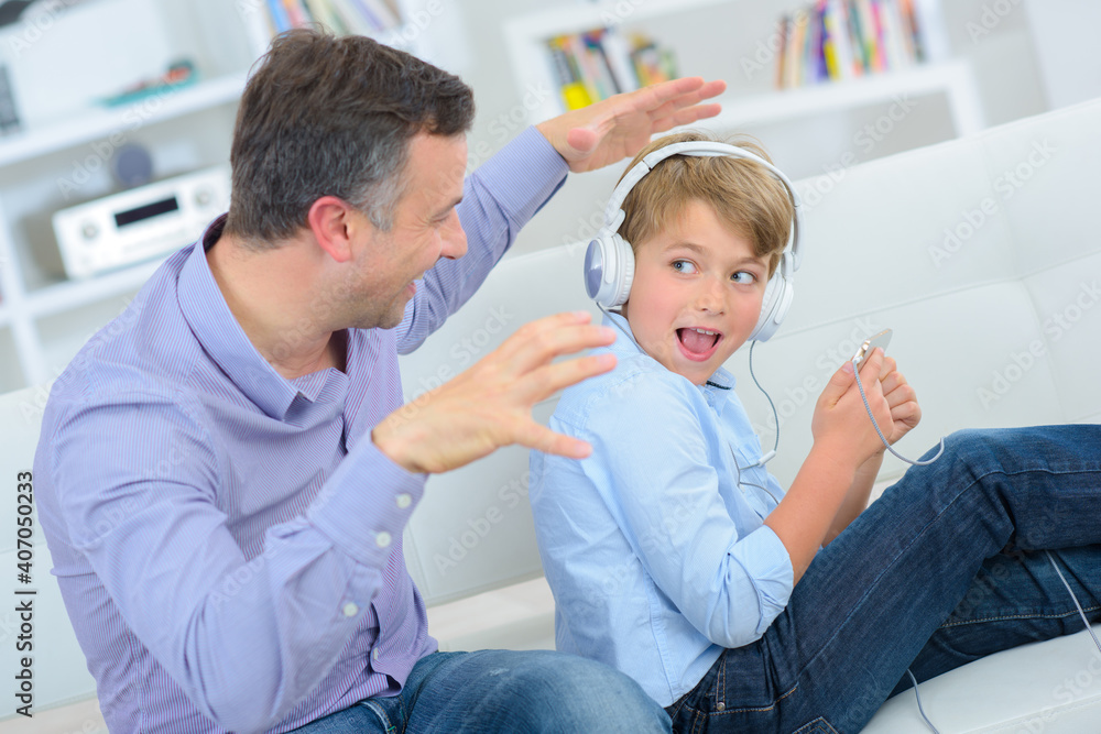 a father scaring his boy a father scaring his boy