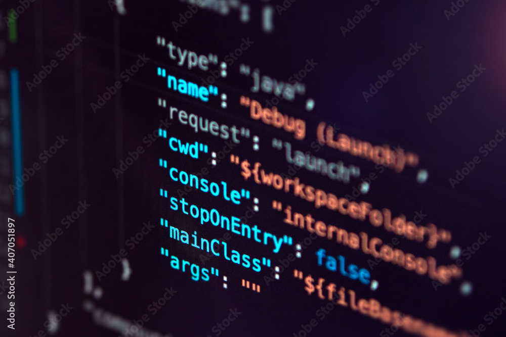 Software developer programming code. Abstract computer script code closeup on monitor screen with bokeh. Software developer programming code. Abstract computer script code closeup on monitor screen with bokeh.