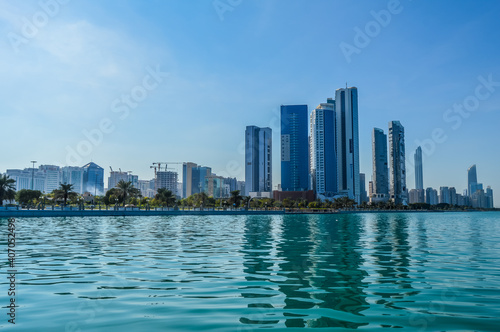 Abu Dhabi city skyline along Corniche beach taken from a boat © shams Faraz Amir