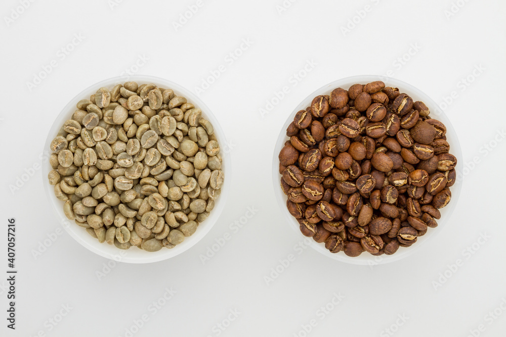 Specialty green and roasted coffee beans from Kenya on a white background. Top view Specialty green and roasted coffee beans from Kenya on a white background. Top view