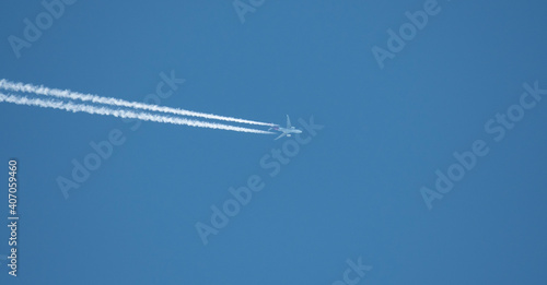 Commercial Airliner With Contrails