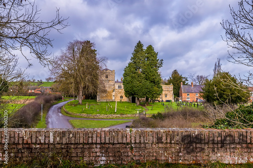 A view from the disused railway bridge across the village of Lubenham, UK in winter photo