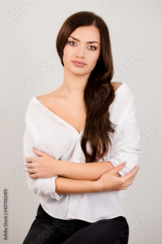 tender charming woman in white shirt