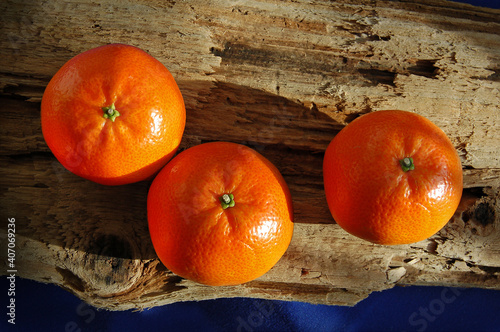 Tangerines on an old weathered board