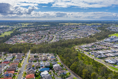 Fototapeta Naklejka Na Ścianę i Meble -  Aerial view of houses in the suburbs