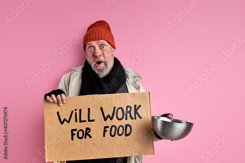 Slika na platnu bum man is ready to work for food, stand with iron bowl in hands, asking for foo
