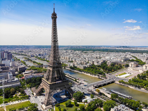 Close-up shot of the Eiffel tower on a drone from a height. Eiffel tower from a height. Paris, France.