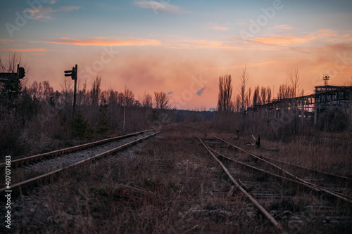 Old rusty abandoned railway at the sunset