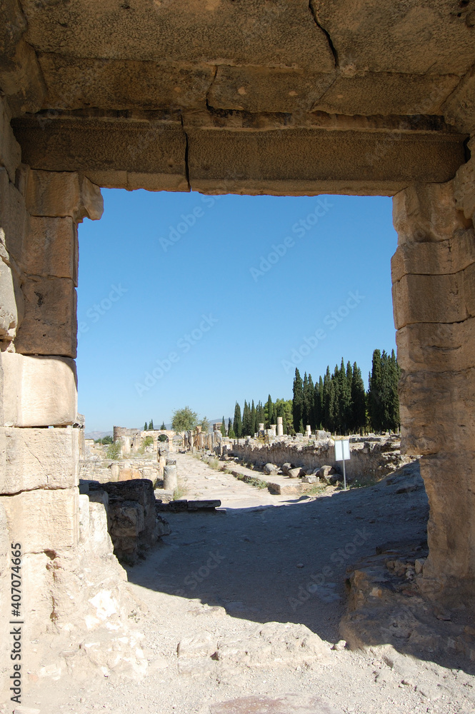Ancient Roman ruins of Hierapolis (Anatolia, Turkey). Next to the natural hot springs of Pamukkale.
