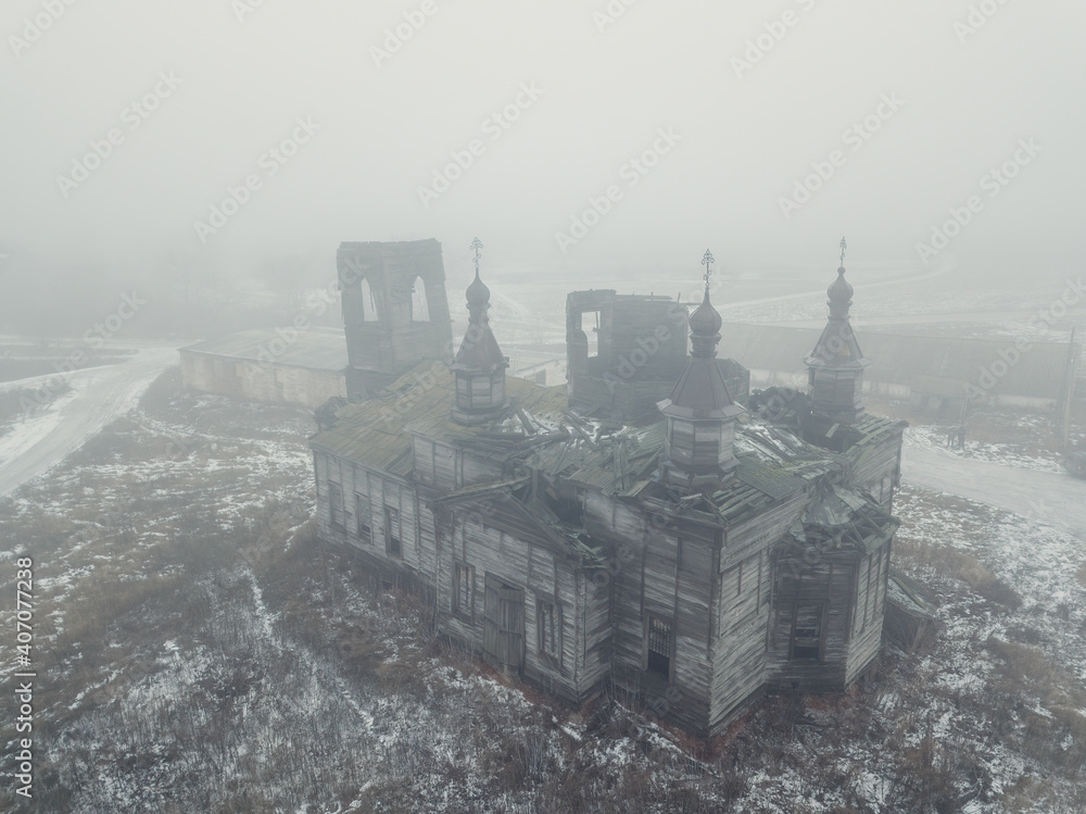 Old abandoned wooden ruined Russian church in Kamenka, Kursk region, aerial view