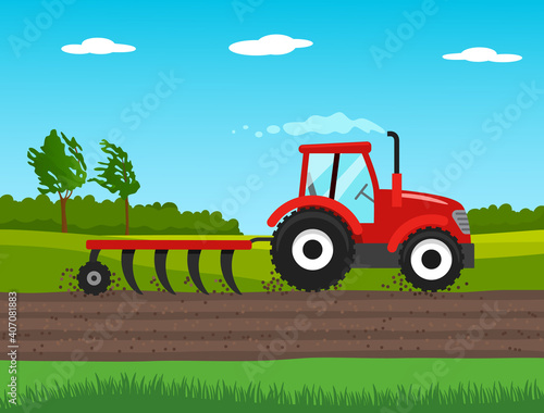 tractor plows the field in spring. agriculture concept.