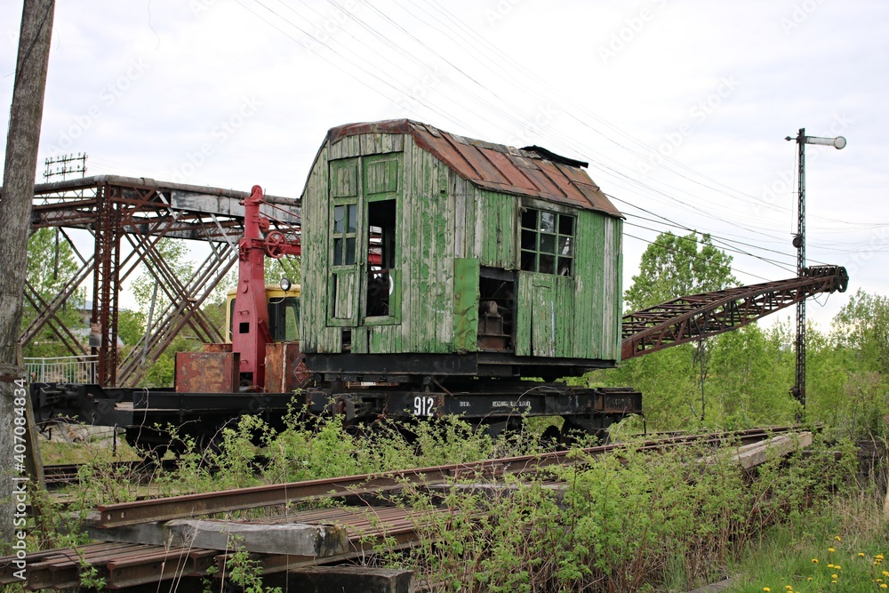 An old crane on a railway platform that has served its working time stands on sidings at the Latvian film studio Cinevilla on May 17, 2019 An old crane on a railway platform that has served its working time stands on sidings at the Latvian film studio Cinevilla on May 17, 2019
