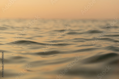 Calm texture at sea. Tropical background with water and sky
