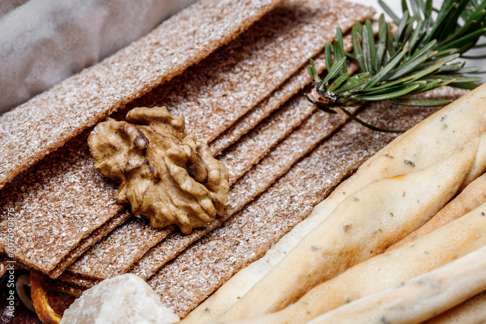 Fototapeta premium Walnut on biscuit texture, walnut kernel. Healthy food from walnuts.