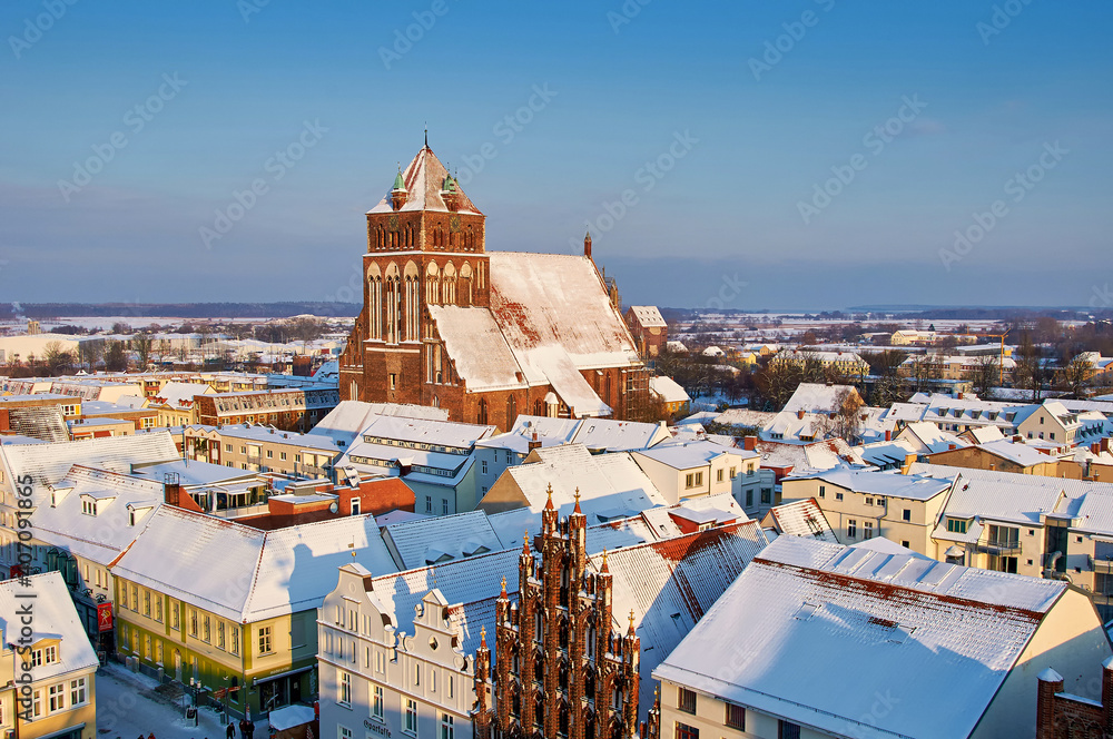 snow covered roof in old town of Greifswald