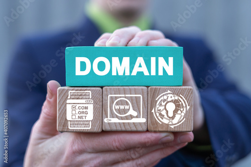 Domains name registration internet website hosting technology on mobile devices. Man holds colorful blocks with domain conceptual banner. Web Hosting Concept.