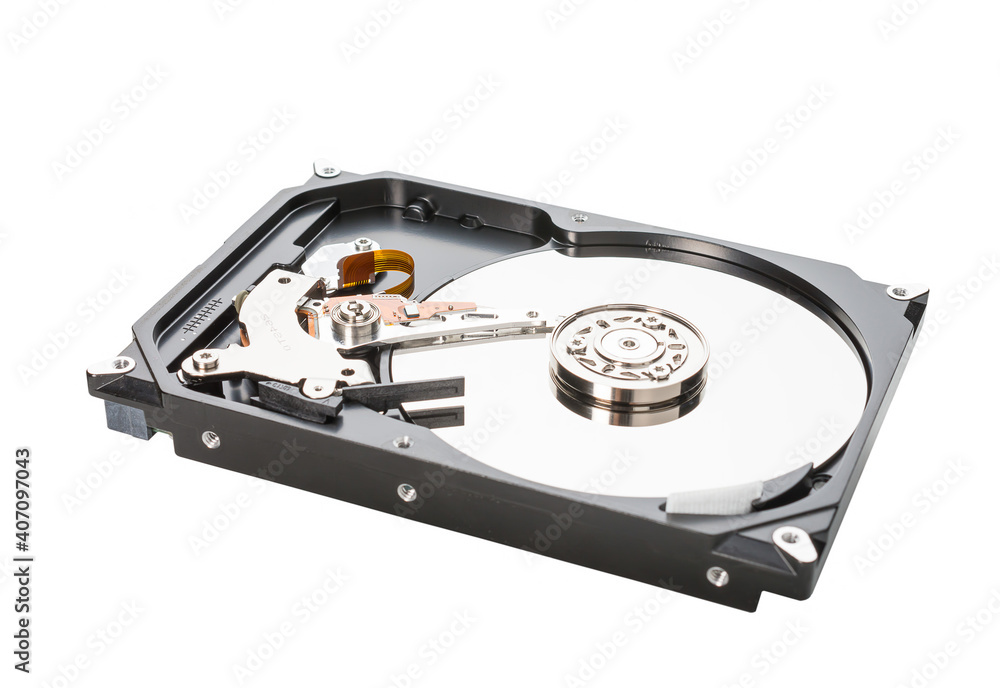 computer hard disk inside view with mirrored blank disks on which data is recorded and a magnetic head. isolated on white. computer hard disk inside view with mirrored blank disks on which data is recorded and a magnetic head. isolated on white.