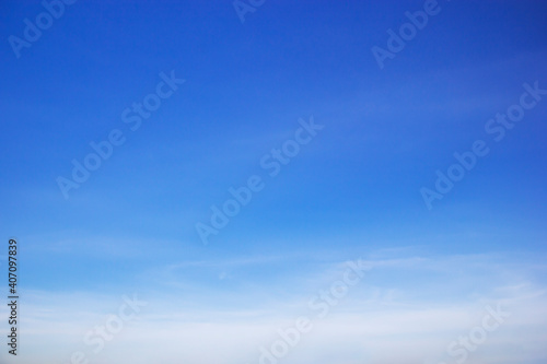 Blue sky background and white clouds soft focus, and copy space © phatthanit