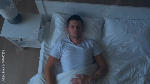 The night sleep of handsome man