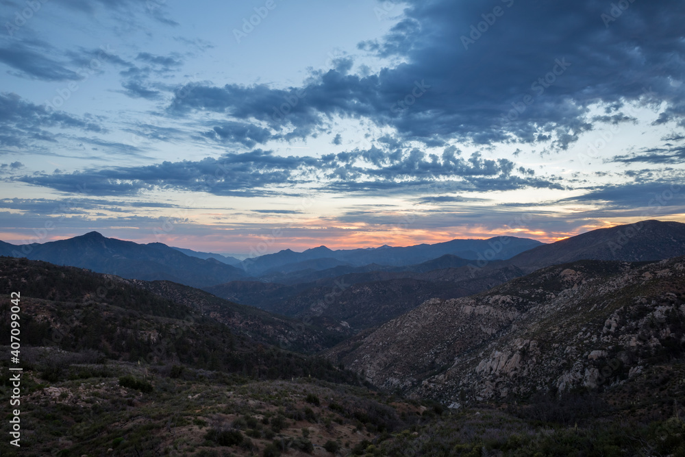 Cloudy sunset above the valley in Angeles National Forest, California 