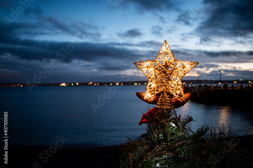 Christmas tree star at Dundarave Park at dusk or sunset, West Vancouver photo