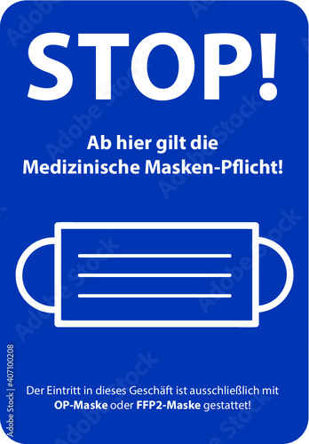Blaues STOP Hinweis Schild für die medizinische Masken-Pflicht in Geschäften