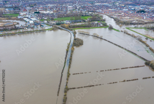 Aerial drone photo of the town of Allerton Bywater near Castleford in Leeds West Yorkshire showing the flooded fields and farm house from the River Aire during a large flood after a storm. photo