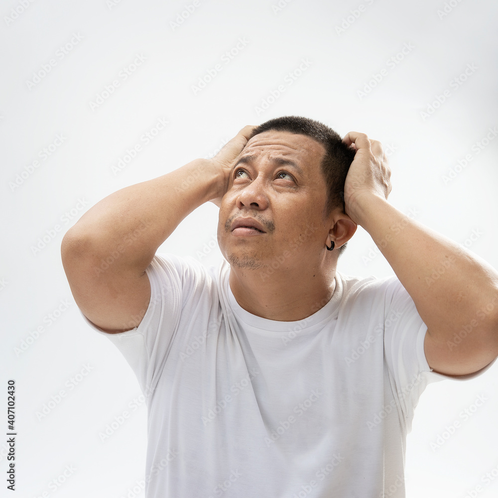 stressed with hand on head. Asian man fears and upset for mistake. Sad looking at camera with shocked, isolated on white background. stressed with hand on head. Asian man fears and upset for mistake. Sad looking at camera with shocked, isolated on white background.