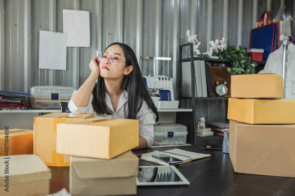 Asian woman think hard serious working laptop computer at home selling online start up small business owner, e-commerce ideas concept. Asian woman think hard serious working laptop computer at home selling online start up small business owner, e-commerce ideas concept.
