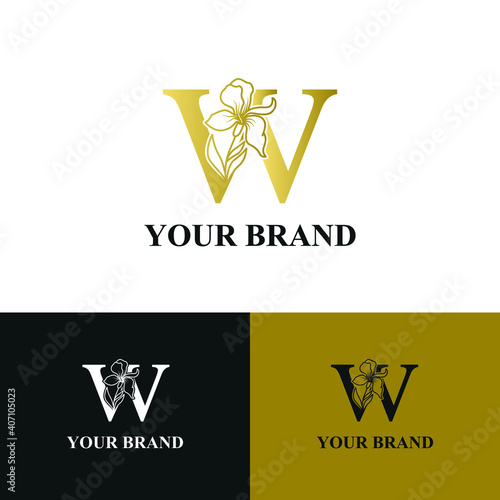 Golden Luxury Initial letter w with February Iris flower for cosmetic, Jewelry, boutique, hotel logo concept vector