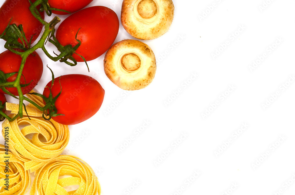 Ingredients for making fettuccine pasta isolated on white background, tomato, mushrooms champignons and macaroni noodles