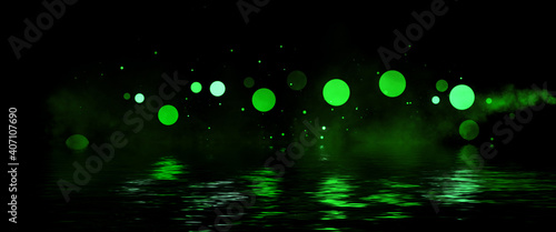 Blurred Green bokeh background with copy space. Abstract luxury glitter effect boke. Sparkling magical dust particles. Magic concept, defocused . Reflection in water.