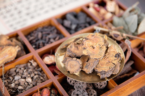 A box of all kinds of traditional Chinese medicine and rhubarb on the box photo