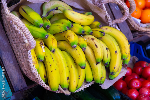 tropical bananas on counter in grocery store