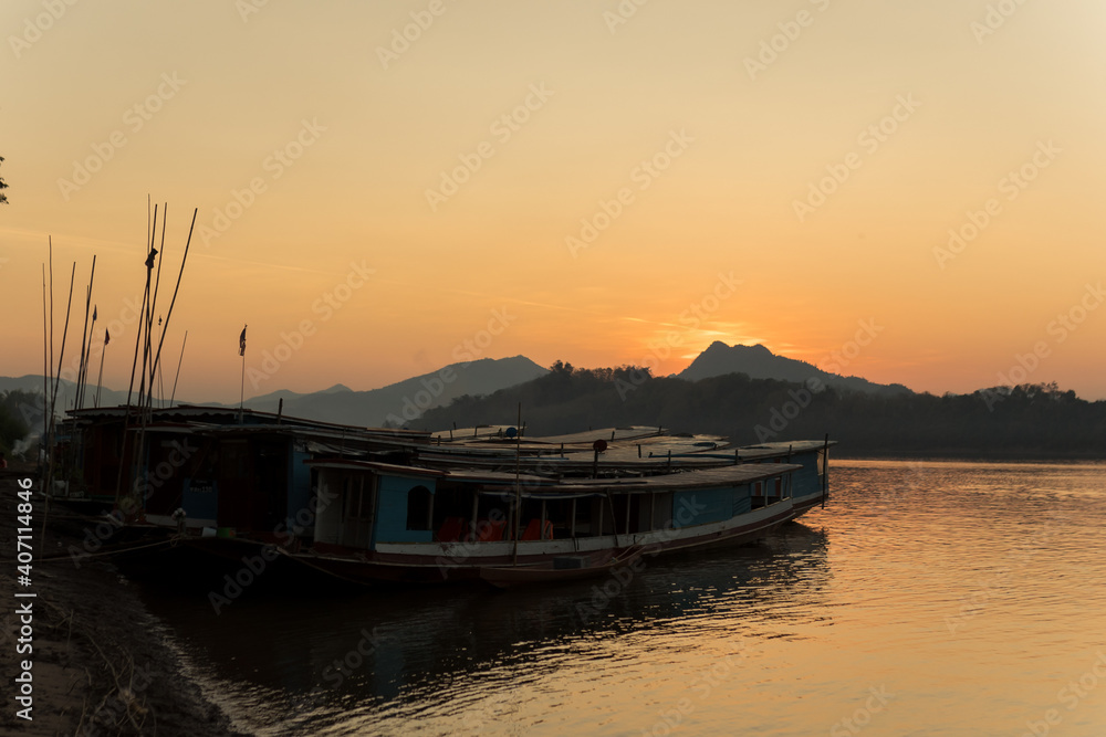 Fototapeta premium Boats in Mekong river, Luang Prabang, Laos