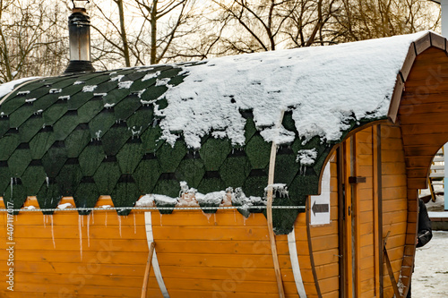 Mobile bath in the form of a wooden barrel near, Mobile winter steam room photo