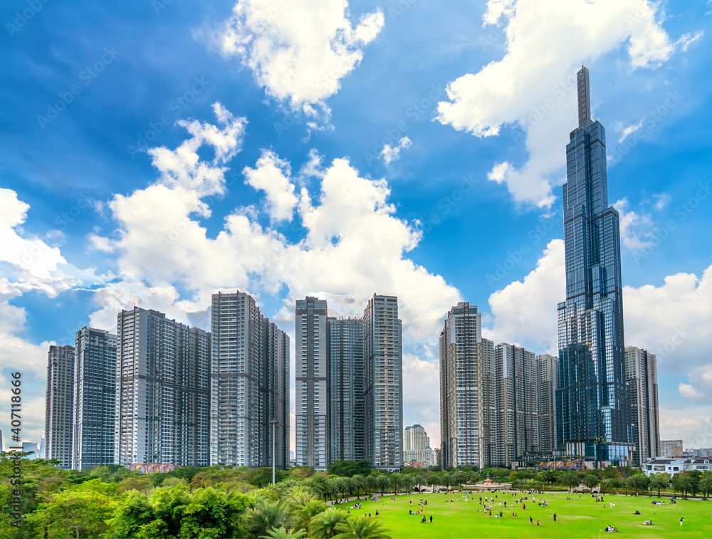 Fototapeta premium Skyscrapers viewed from below towards sky represents urban development with modern architecture to bring international in Ho Chi Minh City, Vietnam