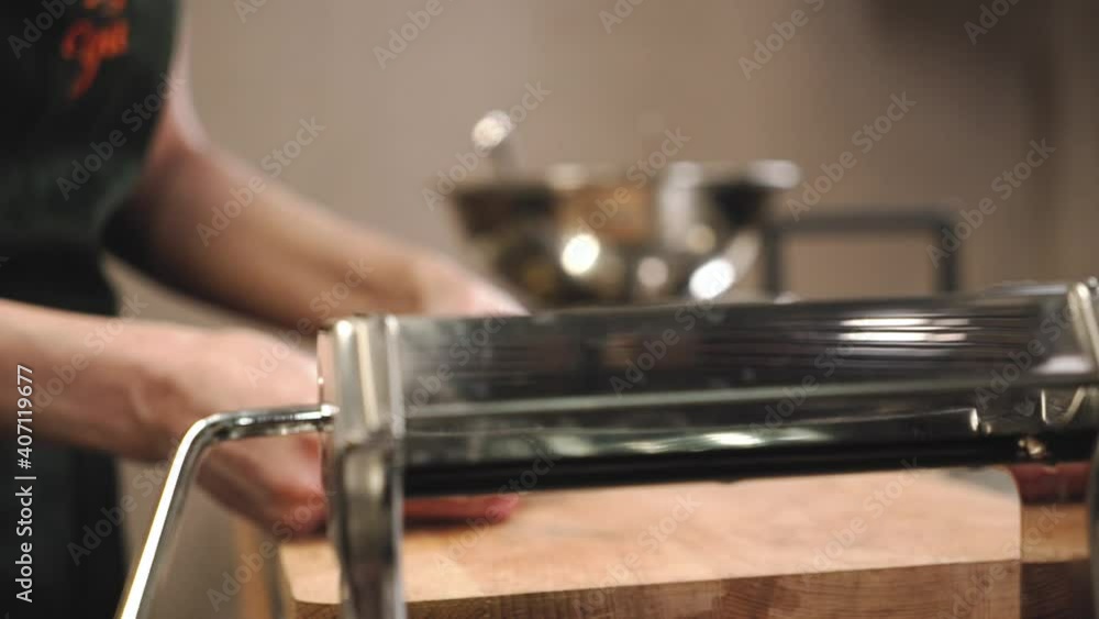 Dough rolling. Chef rolling out the dough. Cooking dough for dumplings. Someone is preparing dough. Dough rolling. Chef rolling out the dough. Cooking dough for dumplings. Someone is preparing dough.