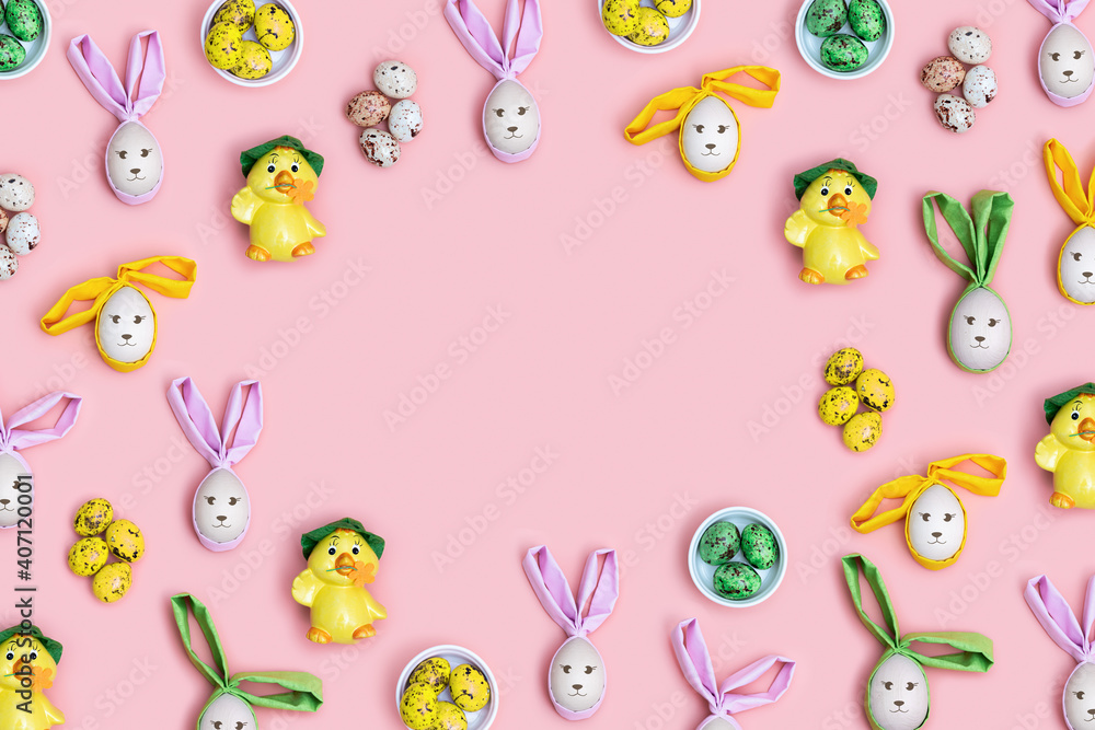Easter Frame from Bunny rabbit and cute little chicken, colorful quail egg on pink background. Easter composition