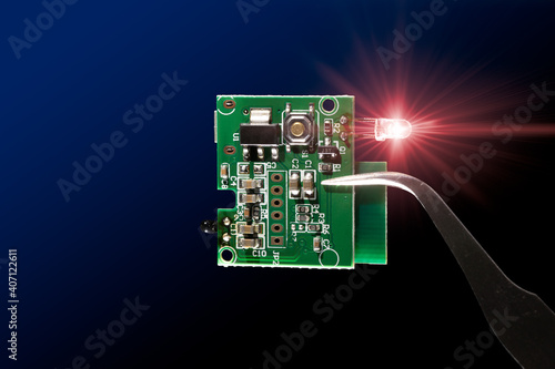 Microcontroller circuit board with infrared led light emitting diode electronic part closeup