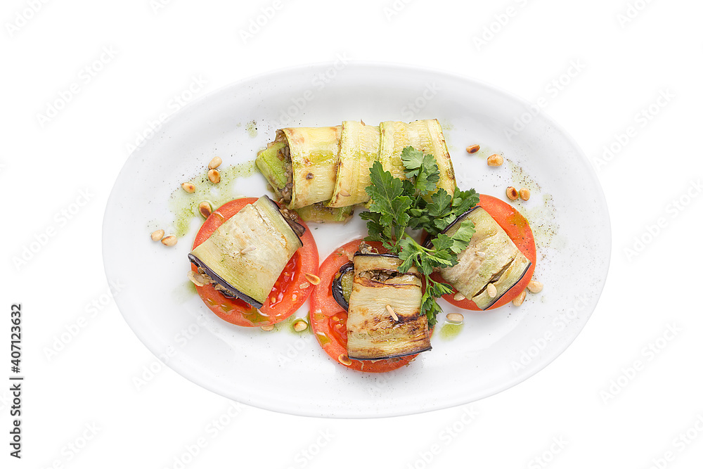 Original serving eggplants and baked tomatoes. Restaurant service concept. Isolated. Original serving eggplants and baked tomatoes. Restaurant service concept. Isolated.