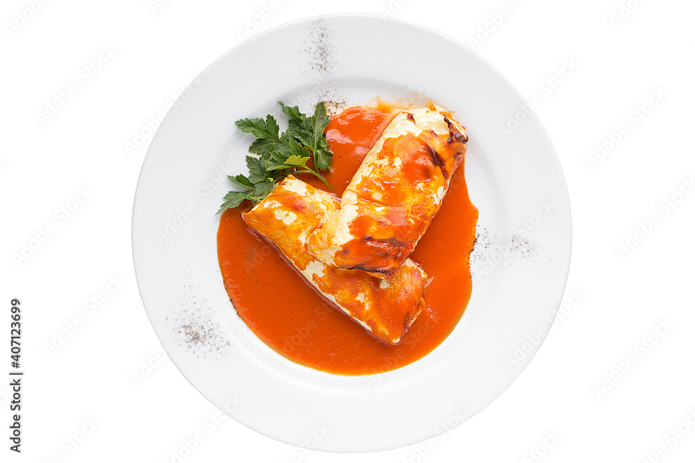 Traditional stuffed cabbage with minced meat and rice, served in a tomato sauce. Restaurant service concept. Isolated. Traditional stuffed cabbage with minced meat and rice, served in a tomato sauce. Restaurant service concept. Isolated.