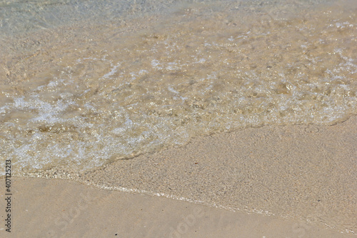 Sea and beach has small wave © Natapob