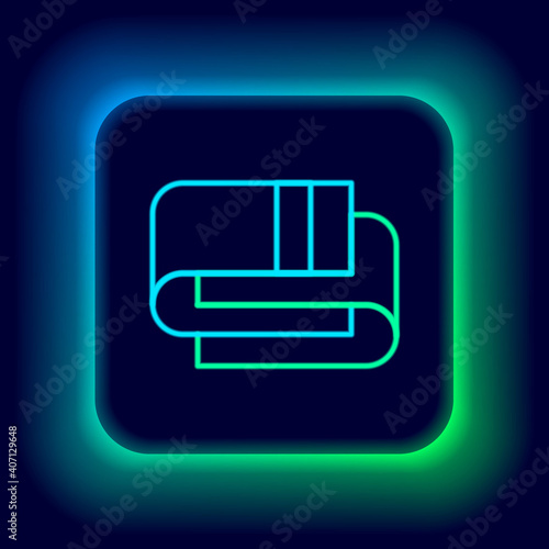 Glowing neon line Towel stack icon isolated on black background. Colorful outline concept. Vector.