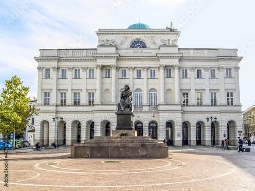 Fotografie Warsaw, Poland - October 9, 2018: Nicolaus Copernicus Monument before the Staszic Palace on Krakowskie Przedmiescie in Warsaw