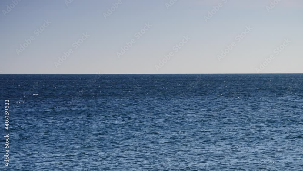 Blue calm sea water surface and skyline. Blue calm sea water surface and skyline.