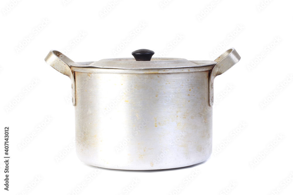 Old metal saucepan. Isolated object on white background Old metal saucepan. Isolated object on white background