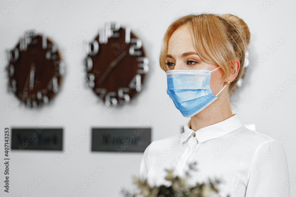 Close up portrait of woman hotel receptionist wearing medical mask Close up portrait of woman hotel receptionist wearing medical mask