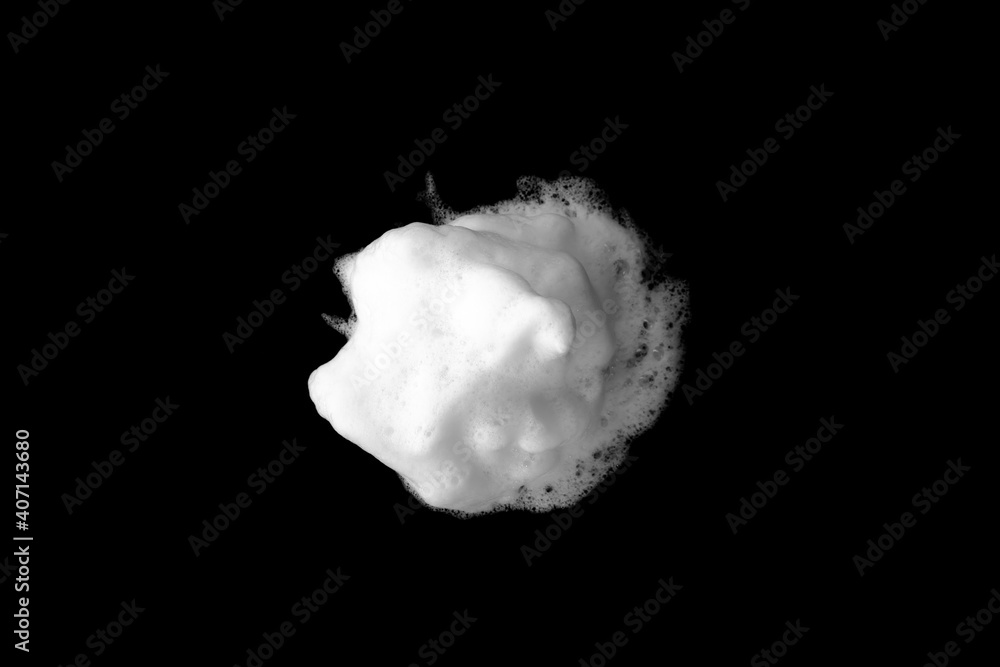 White soapy foam texture. Shampoo foam with bubbles.White facial foam creamy bubble soap sponge isolated on black background. White soapy foam texture. Shampoo foam with bubbles.White facial foam creamy bubble soap sponge isolated on black background.